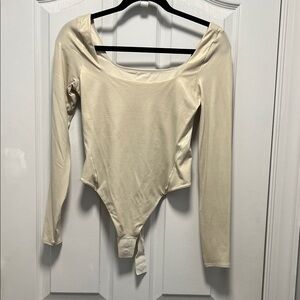 Lululemon Athletica Cream Long Sleeve Bodysuit